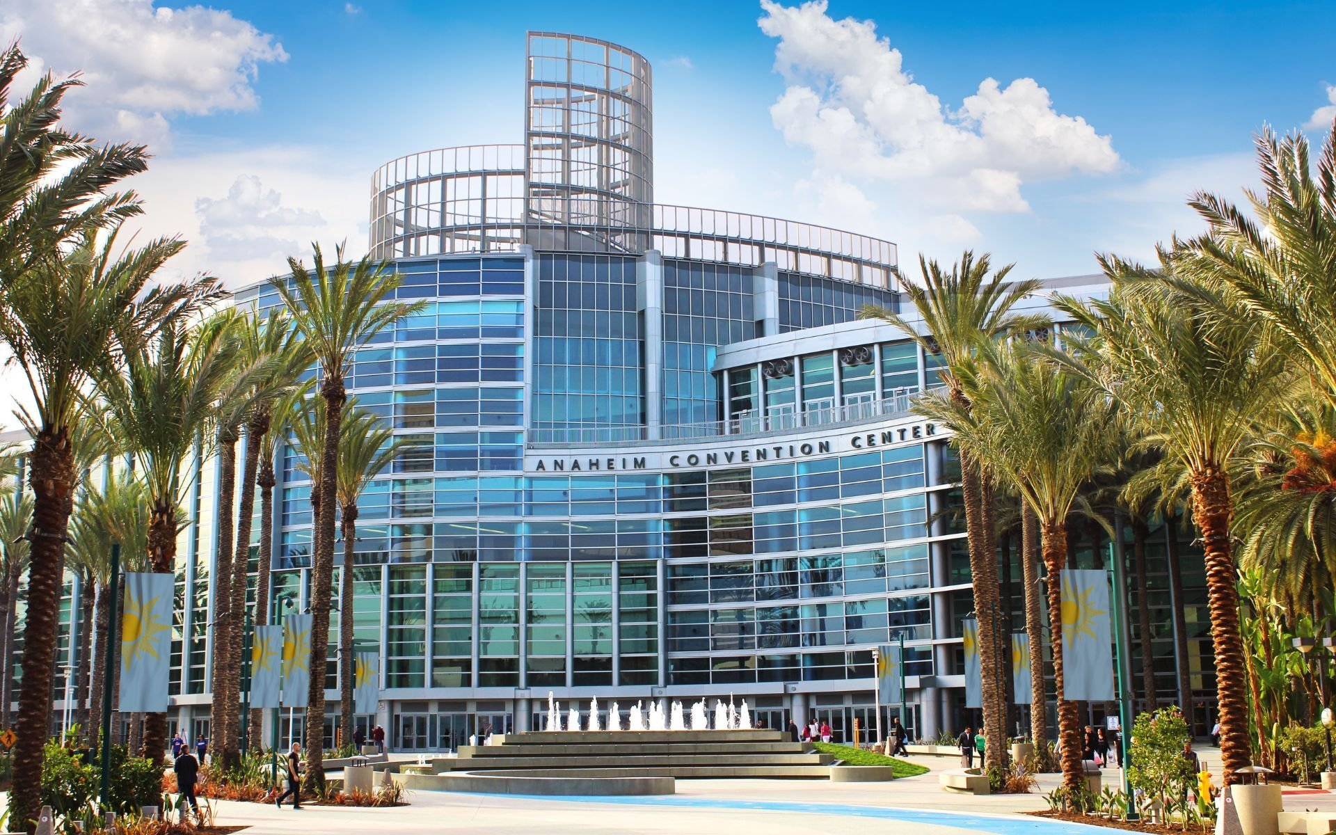An exterior image of the Anaheim Convention Center on a sunny day.
